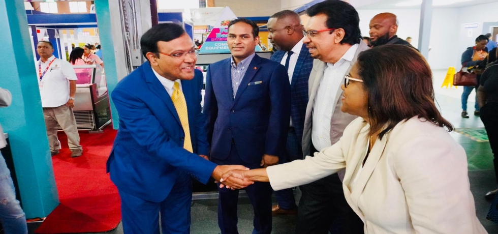 High Commissioner greets Sen. the Hon. Paula Gopee-Scoon, Minister of Trade & Industry, Sen. the Hon. Kazim Hosein, Minister of Agriculture, Land & Fisheries and Mr. Randall Karim, Permanent Secretary, Ministry of Trade & Industry, T&T at 25th Trade & Investment Convention on 12 July, 2024. 